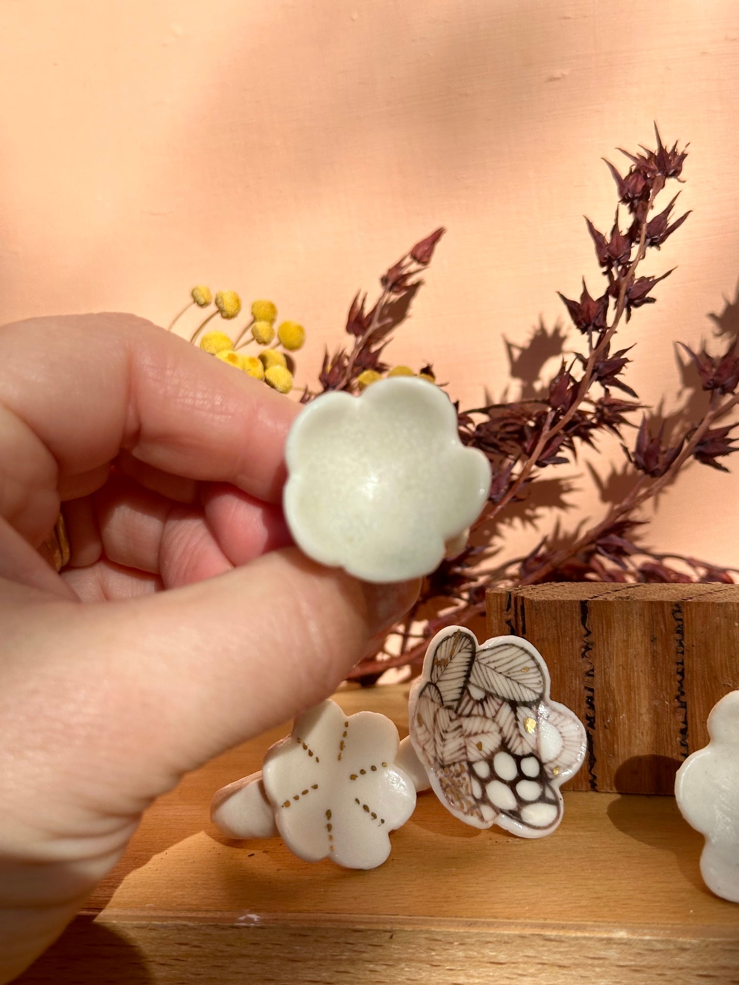 One hand painted or white w/ gold porcelain ‘flower’ ring