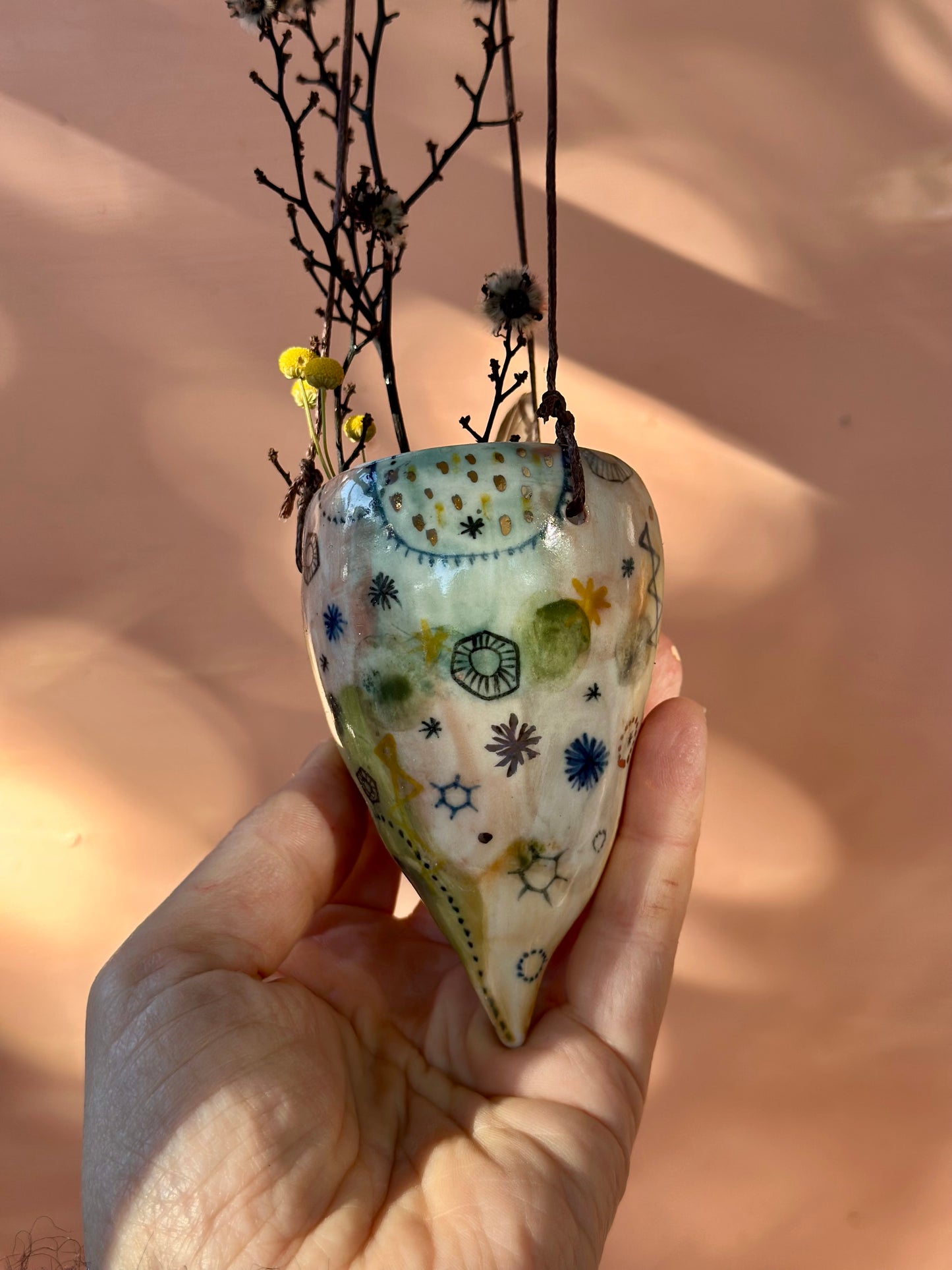Hand painted ‘stars and cells’ porcelain hanging pod