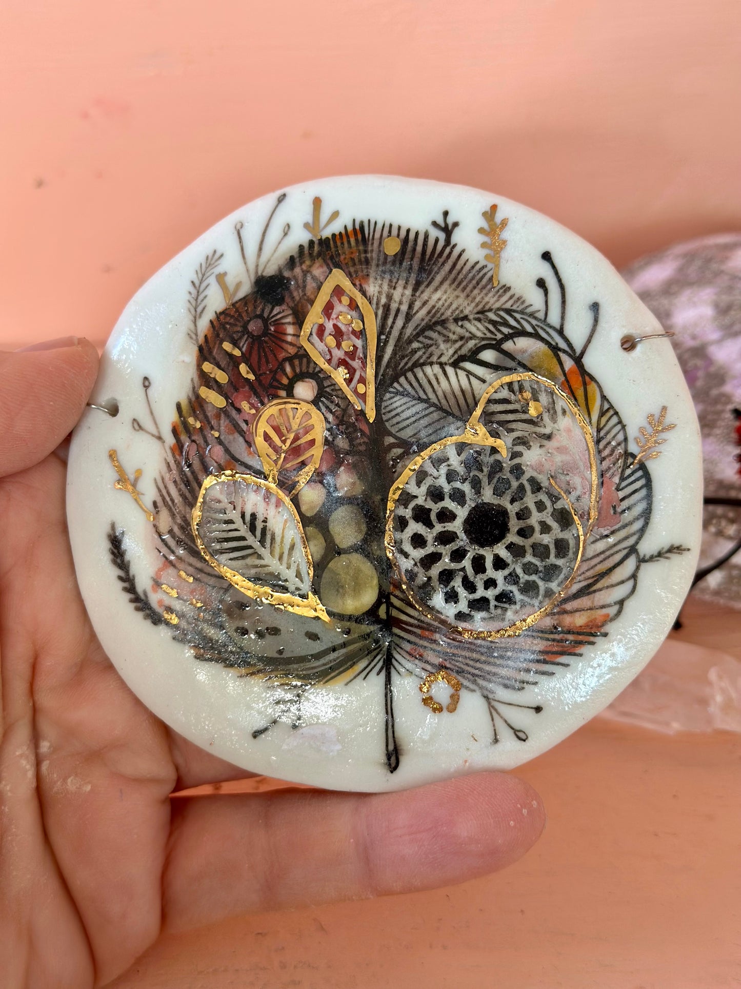 Sepia ‘Feather’ porcelain wall piece, with gold detail
