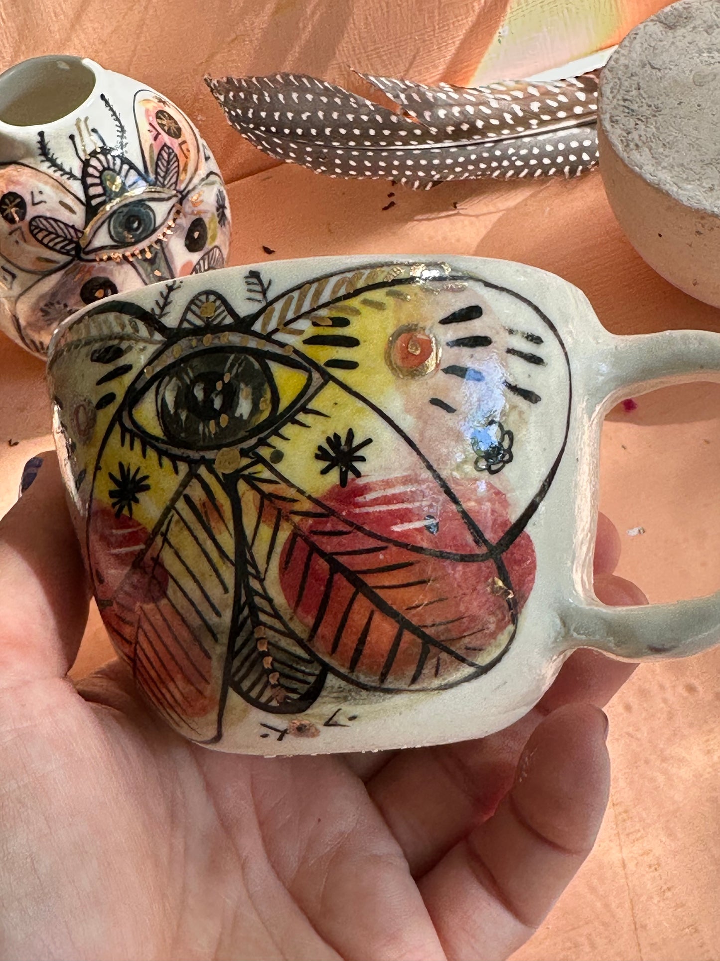‘moth’ hand painted cup