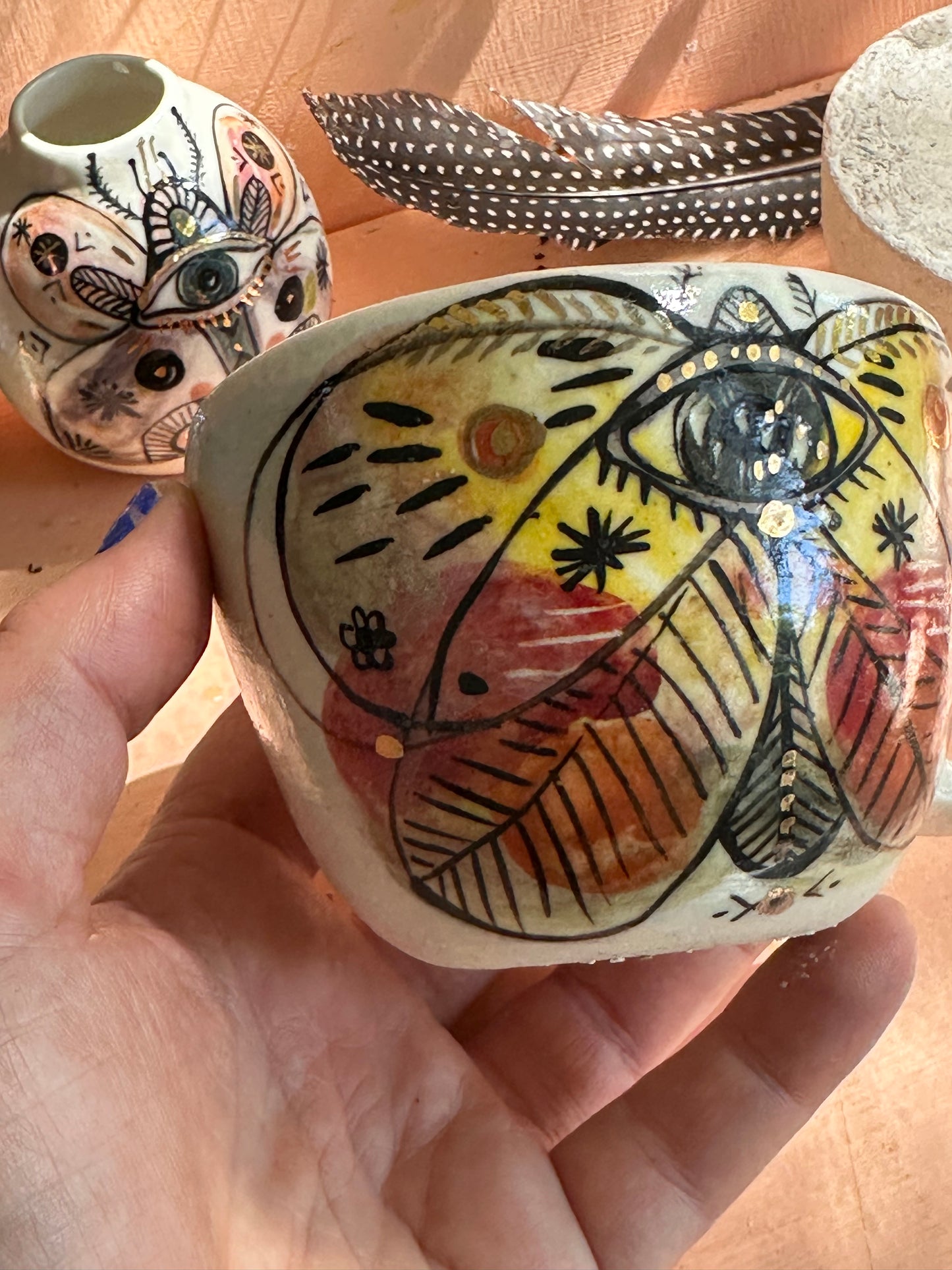 ‘moth’ hand painted cup