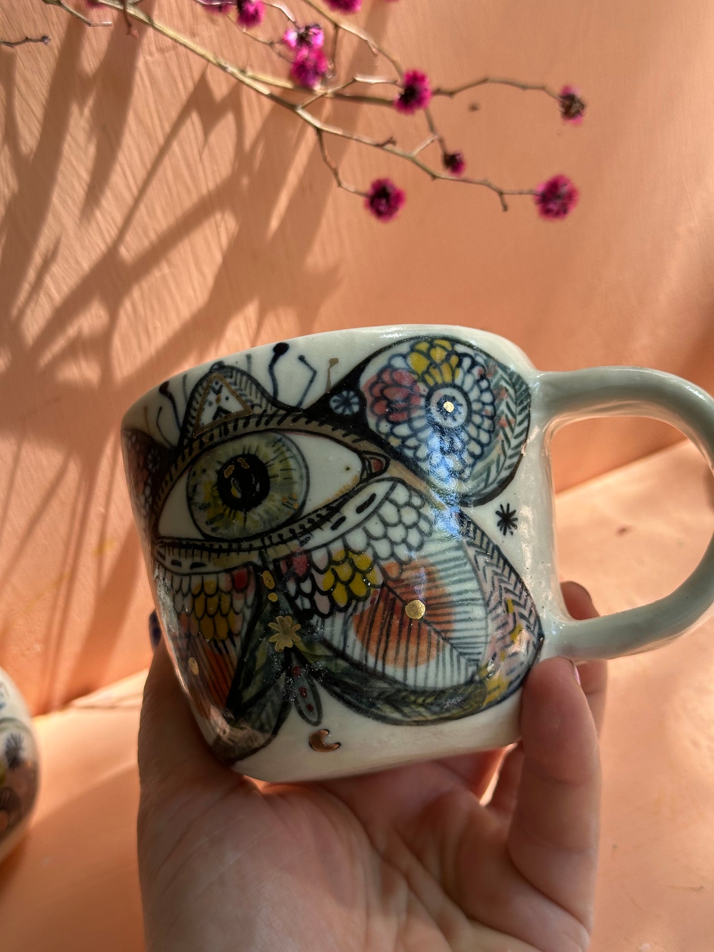 One ‘moth’ hand painted cup