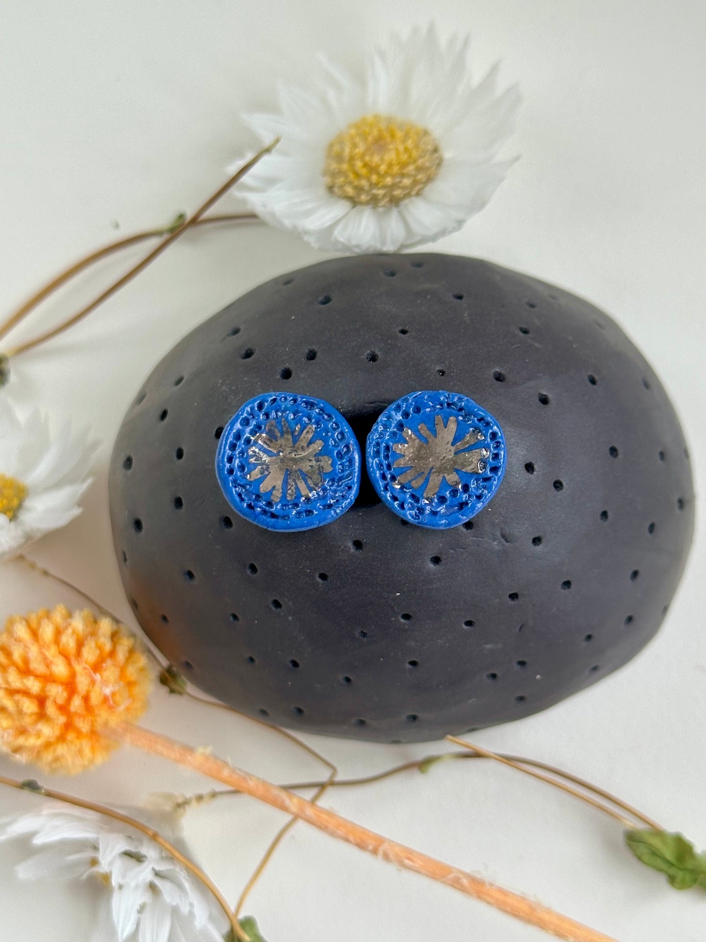 Blue porcelain studs with silver star