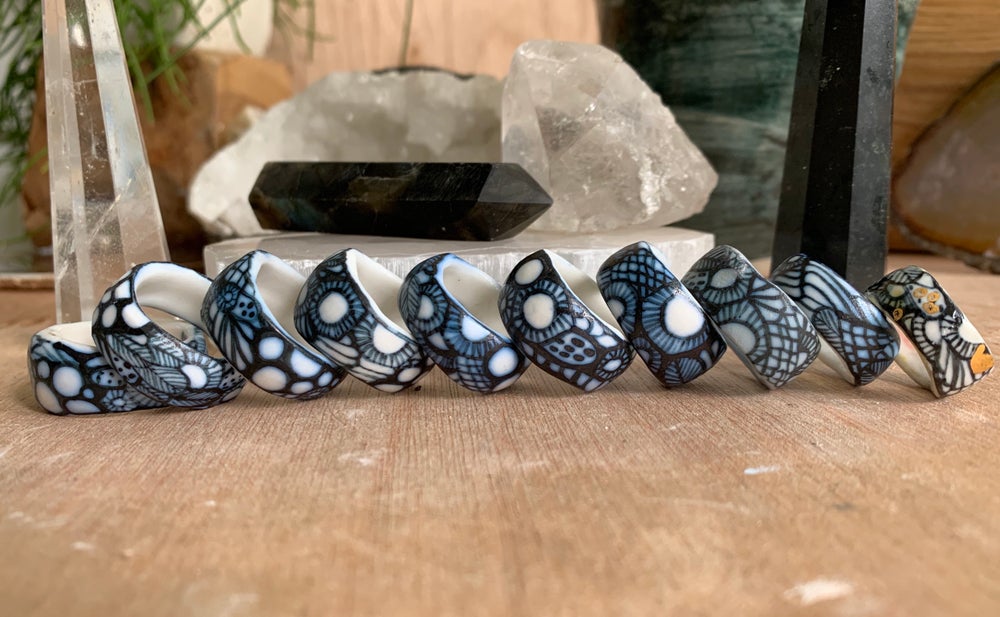 One blue and white ‘seafoam’ band ring