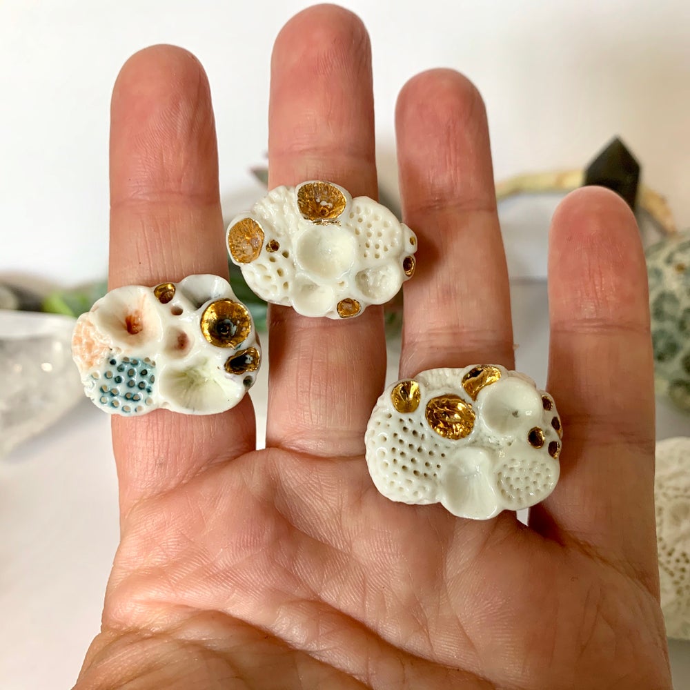 White with gold accent ‘rock coral’ ring