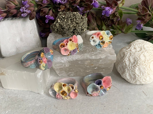 One gold  lustre with Blue/ pink / purple  tones ‘rock coral’ porcelain ring