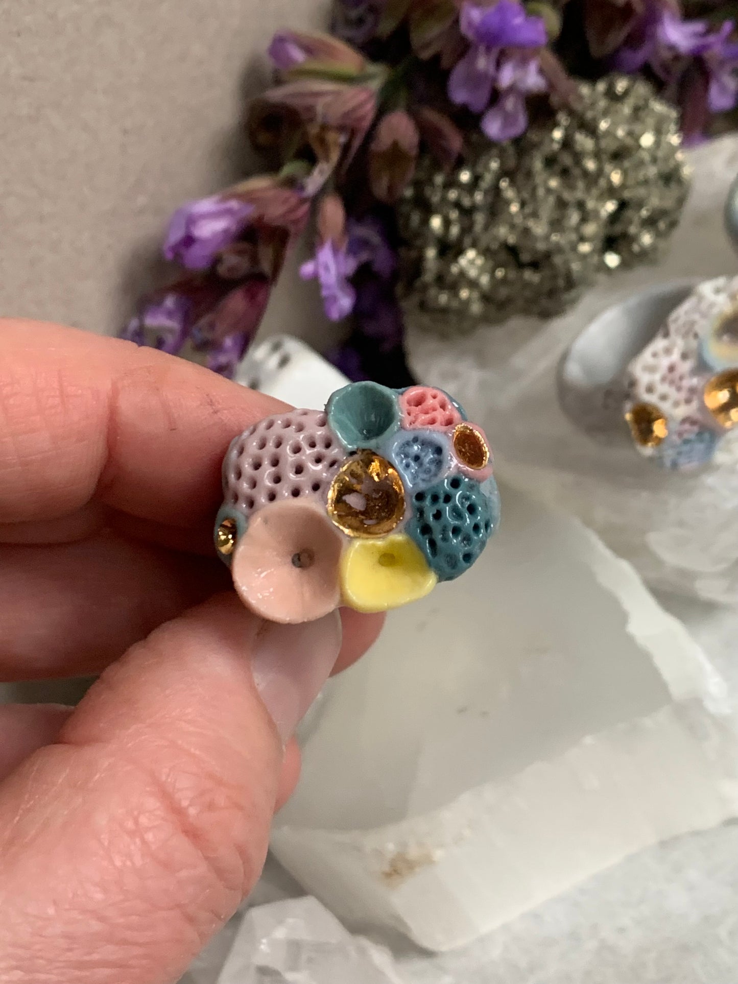 One gold lustre with Blue/ pink / purple tones ‘rock coral’ porcelain ring