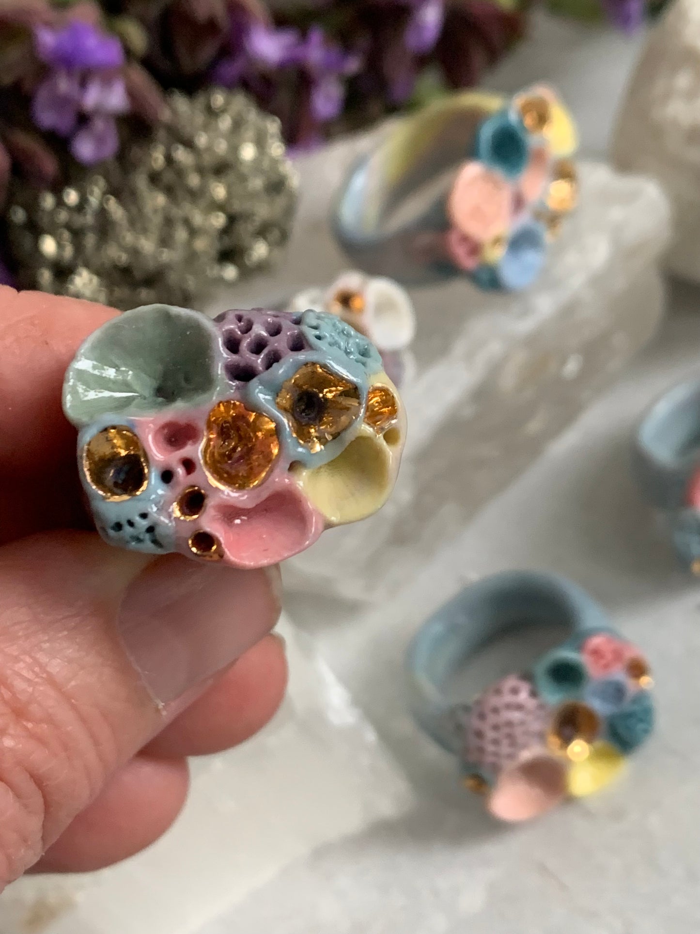 One gold lustre with Blue/ pink / purple tones ‘rock coral’ porcelain ring