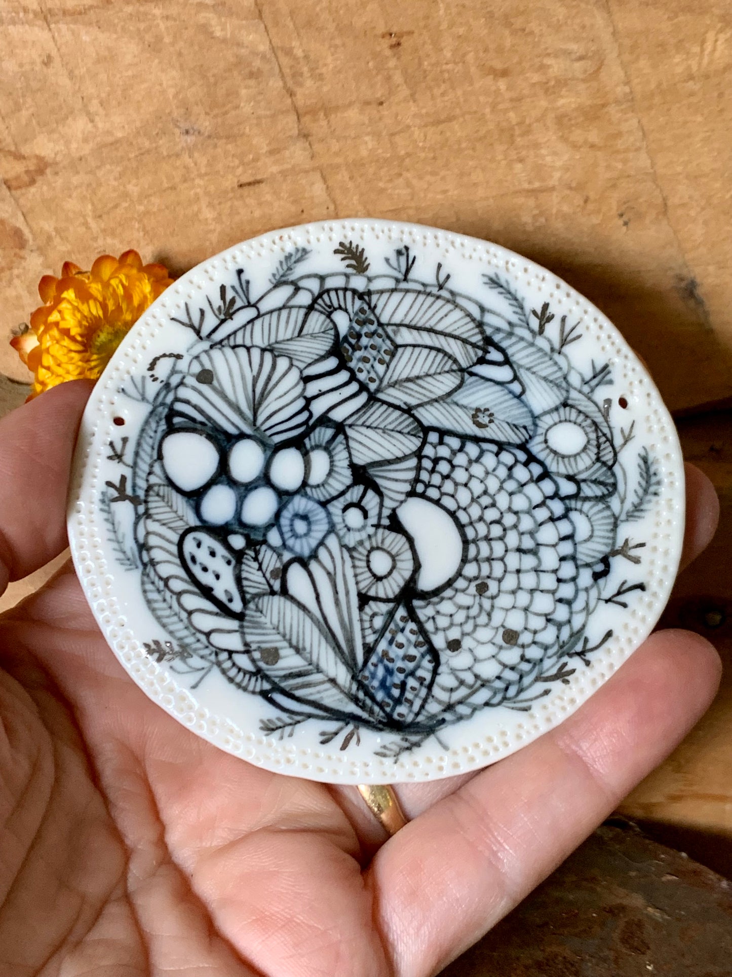 Small Indigo ‘Seafoam’ porcelain wall piece with gold detail