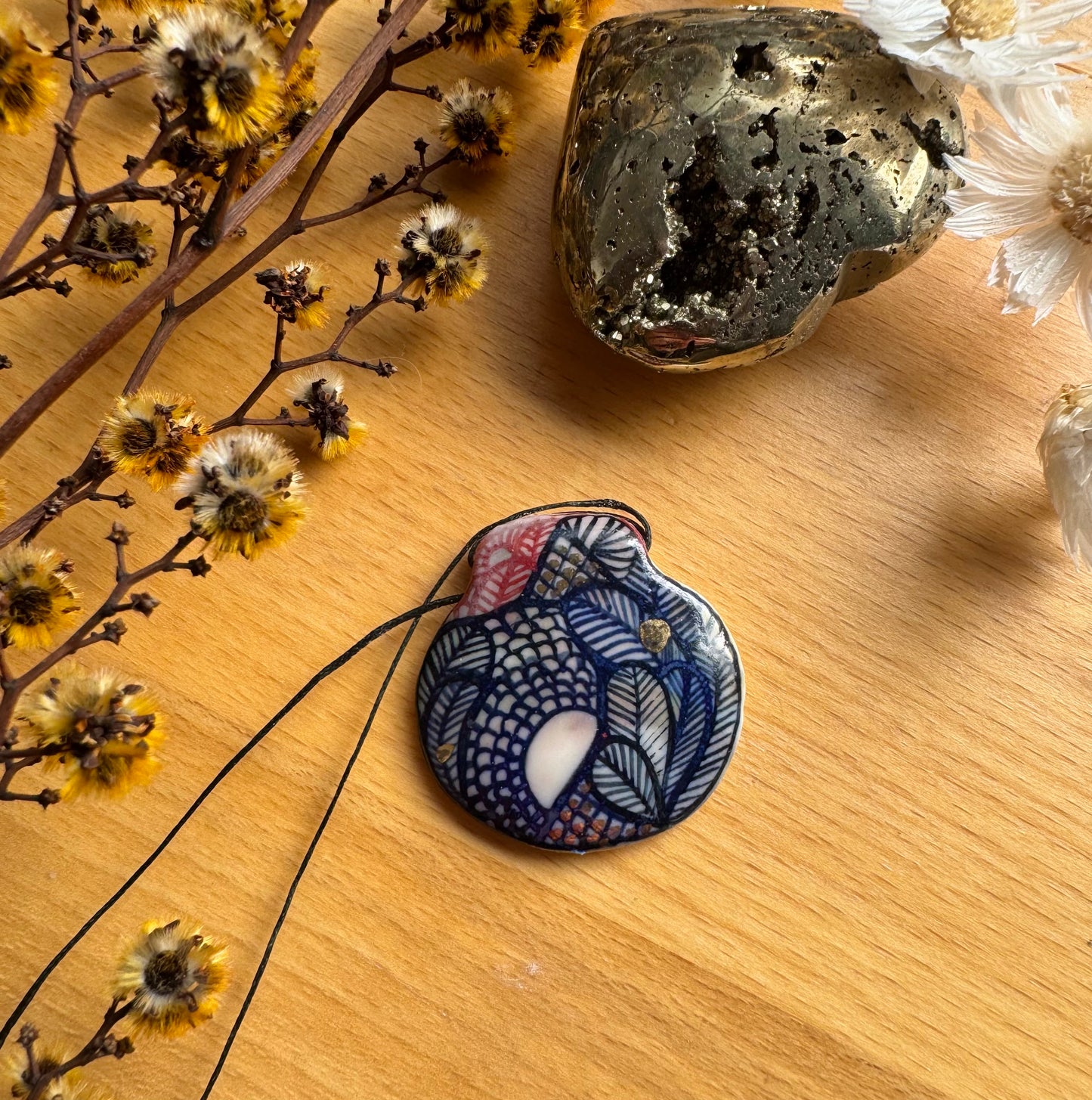 Hand Detailed Pendant with Gold Lustre