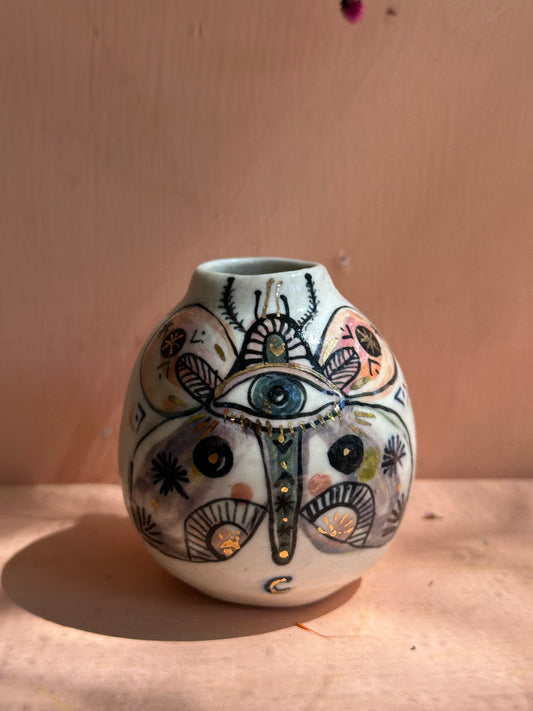 ‘Hand painted ‘the protective eye’ moth vase