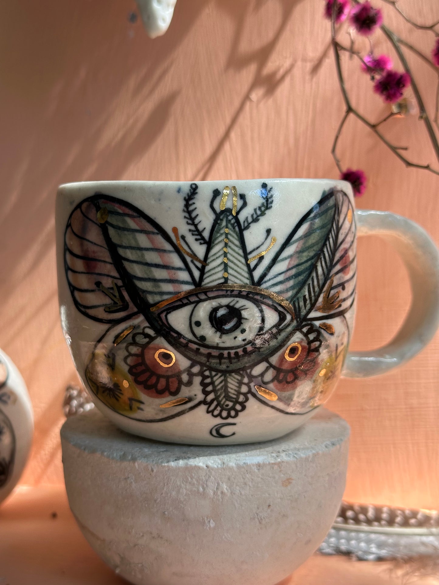 ‘moth’ hand painted cup