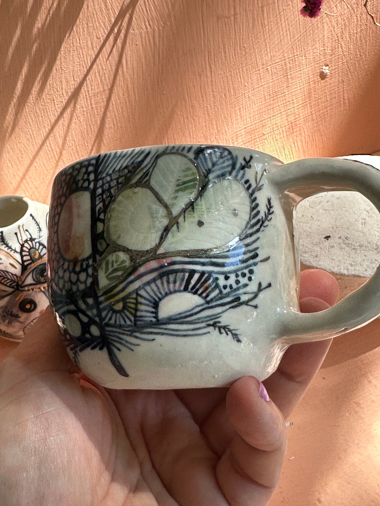 ‘Feather’ hand painted cup