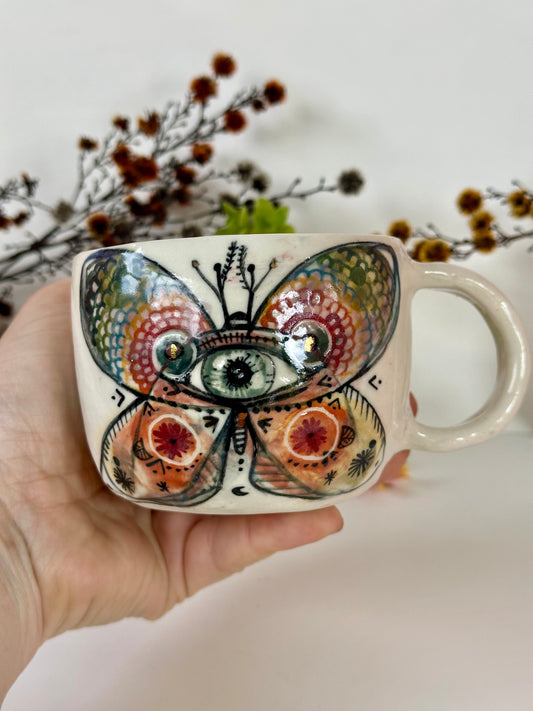 ‘moth’ hand painted cup