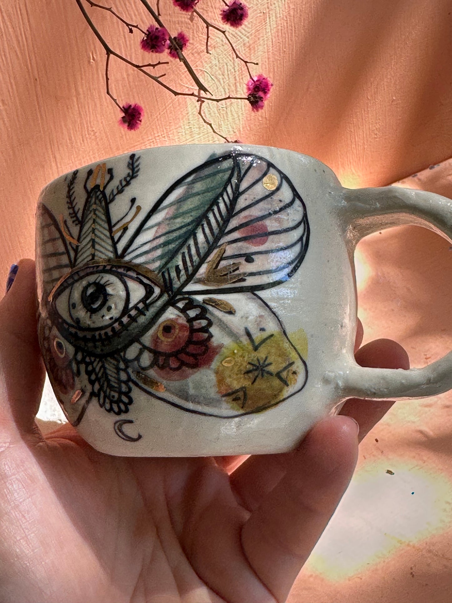 ‘moth’ hand painted cup