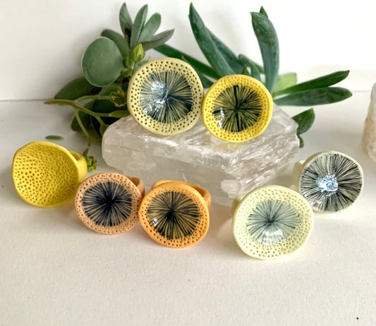 One yellow / orange porcelain ‘star’ or ‘coral dot’ ring