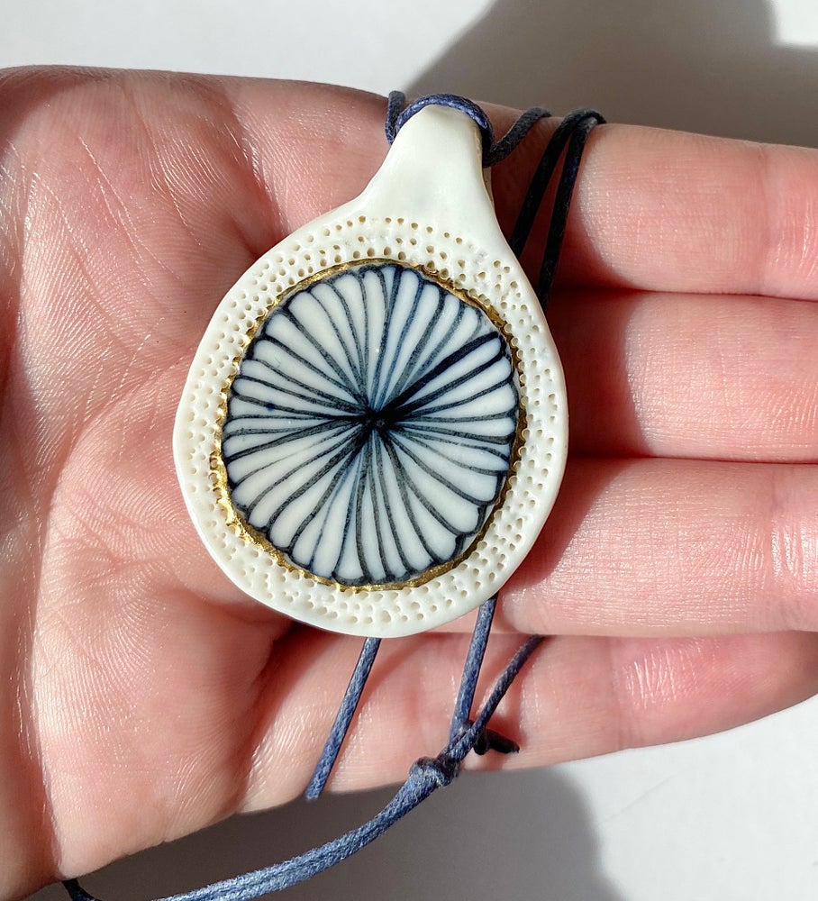 Porcelain indigo flower pendant