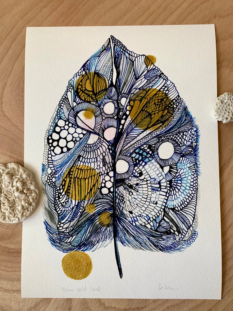 ‘Blue gold leaf’ with hand drawn gold ink details.