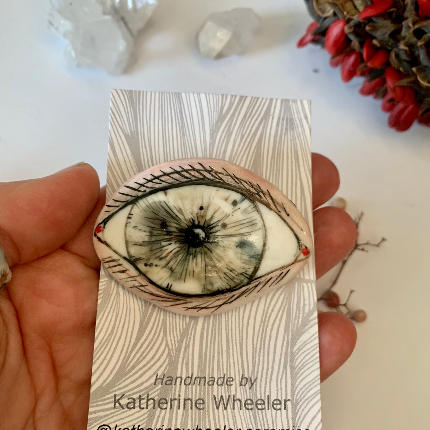 ‘The protective eye’ handpainted porcelain brooch, choose one