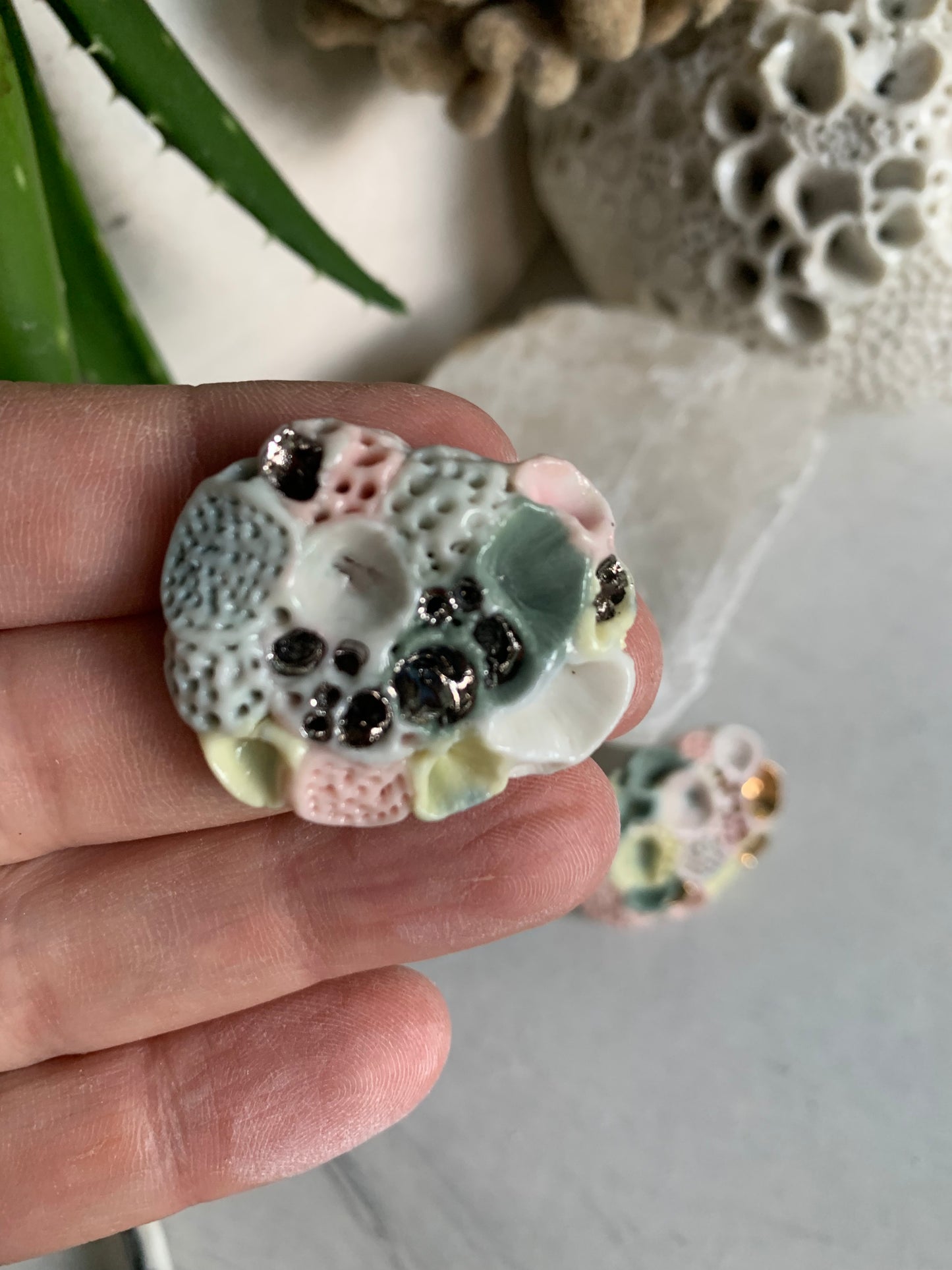 ’Rock coral’ coloured porcelain brooch, choose one