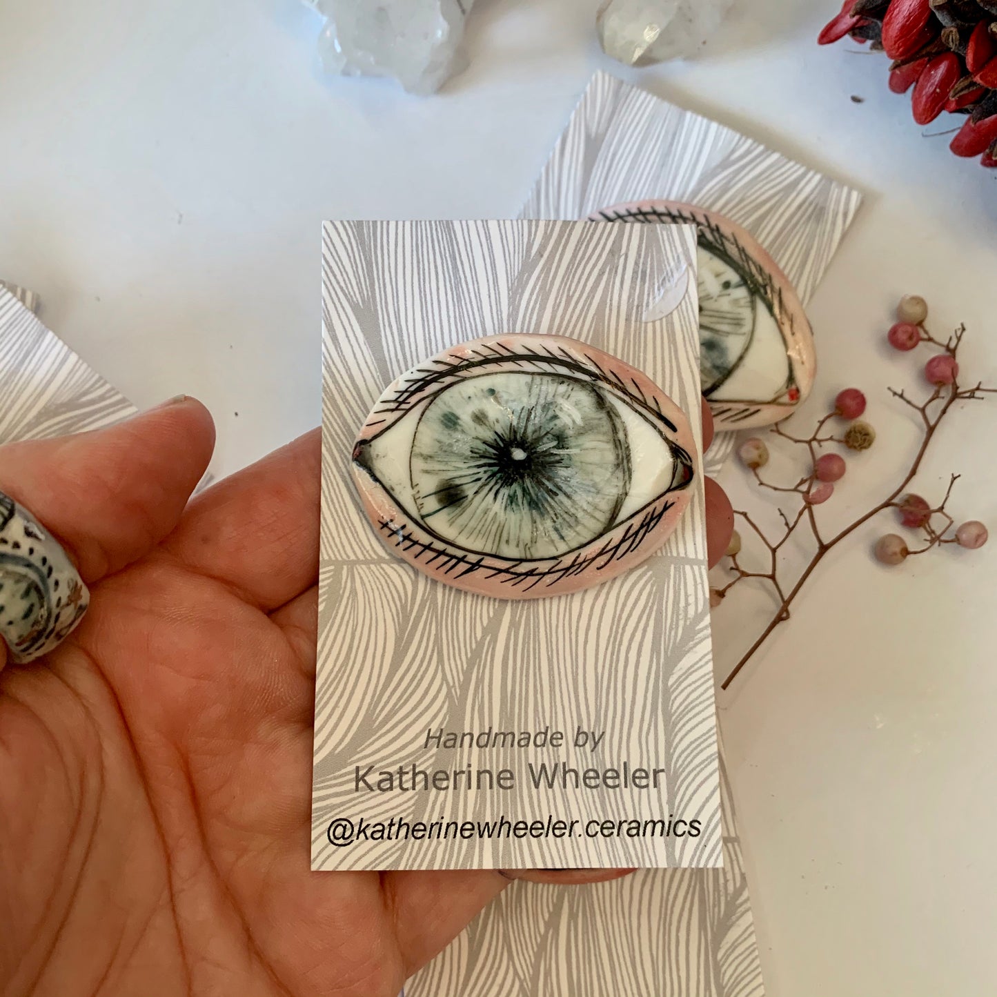 ‘The protective eye’ handpainted porcelain brooch, choose one