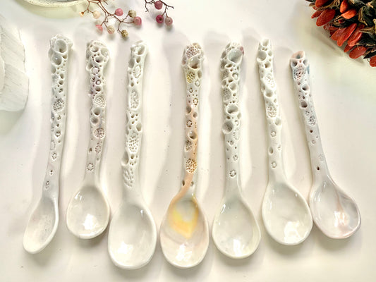 One Porcelain hand formed ‘coral’ spoon