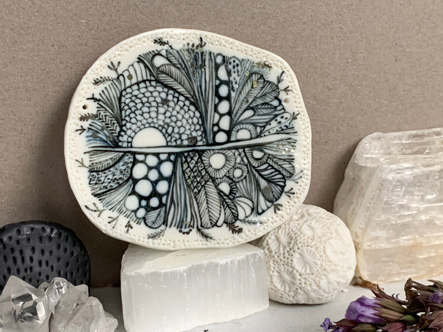 ‘Indigo Seafoam’ small porcelain wall piece, with silver detail