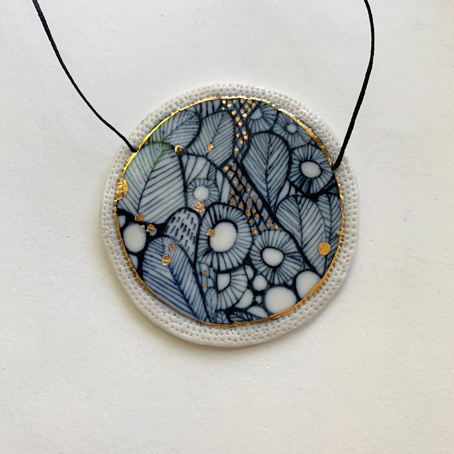 Indigo hand painted pendant with gold lustre detail