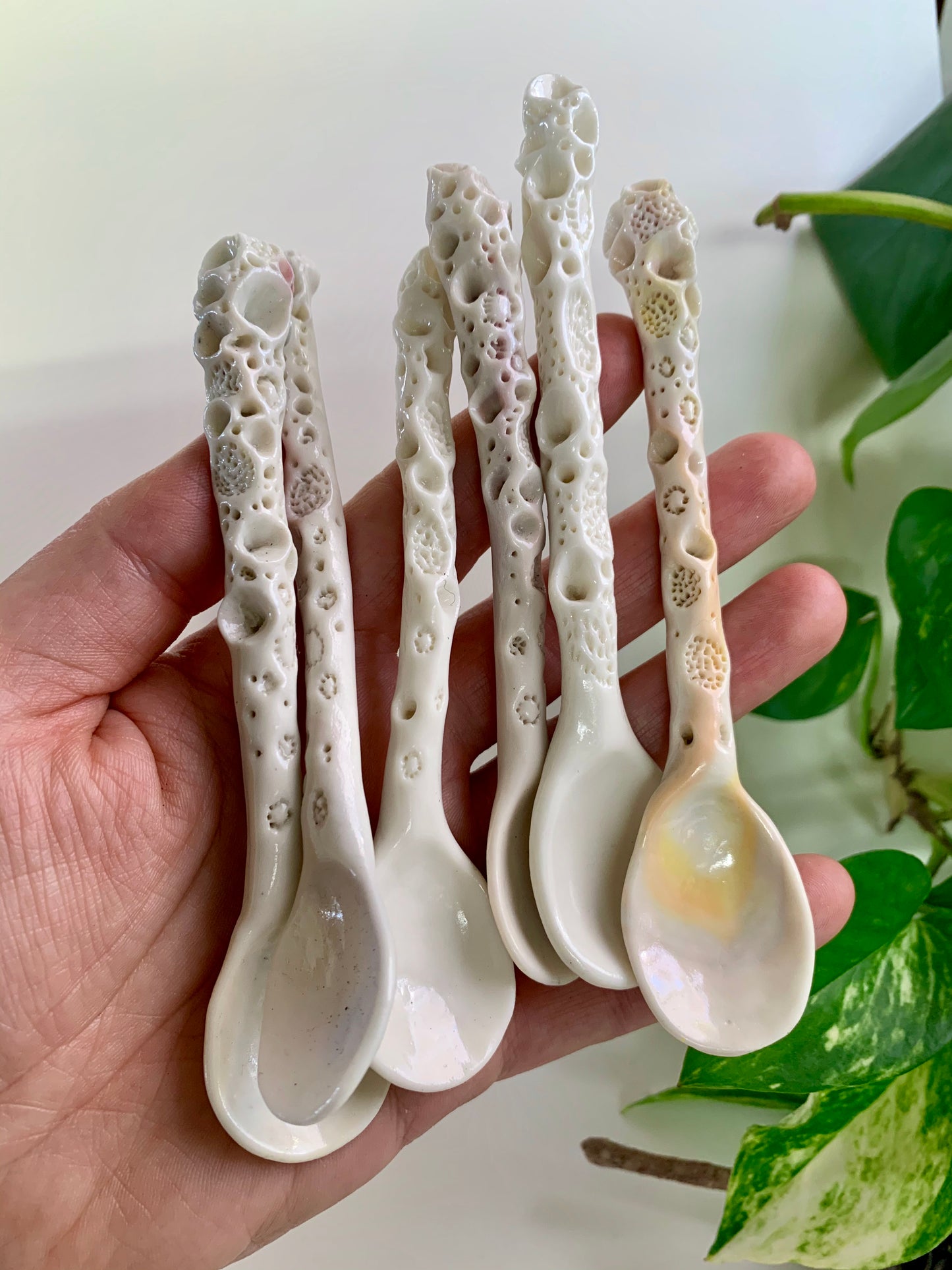 One Porcelain hand formed ‘coral’ spoon