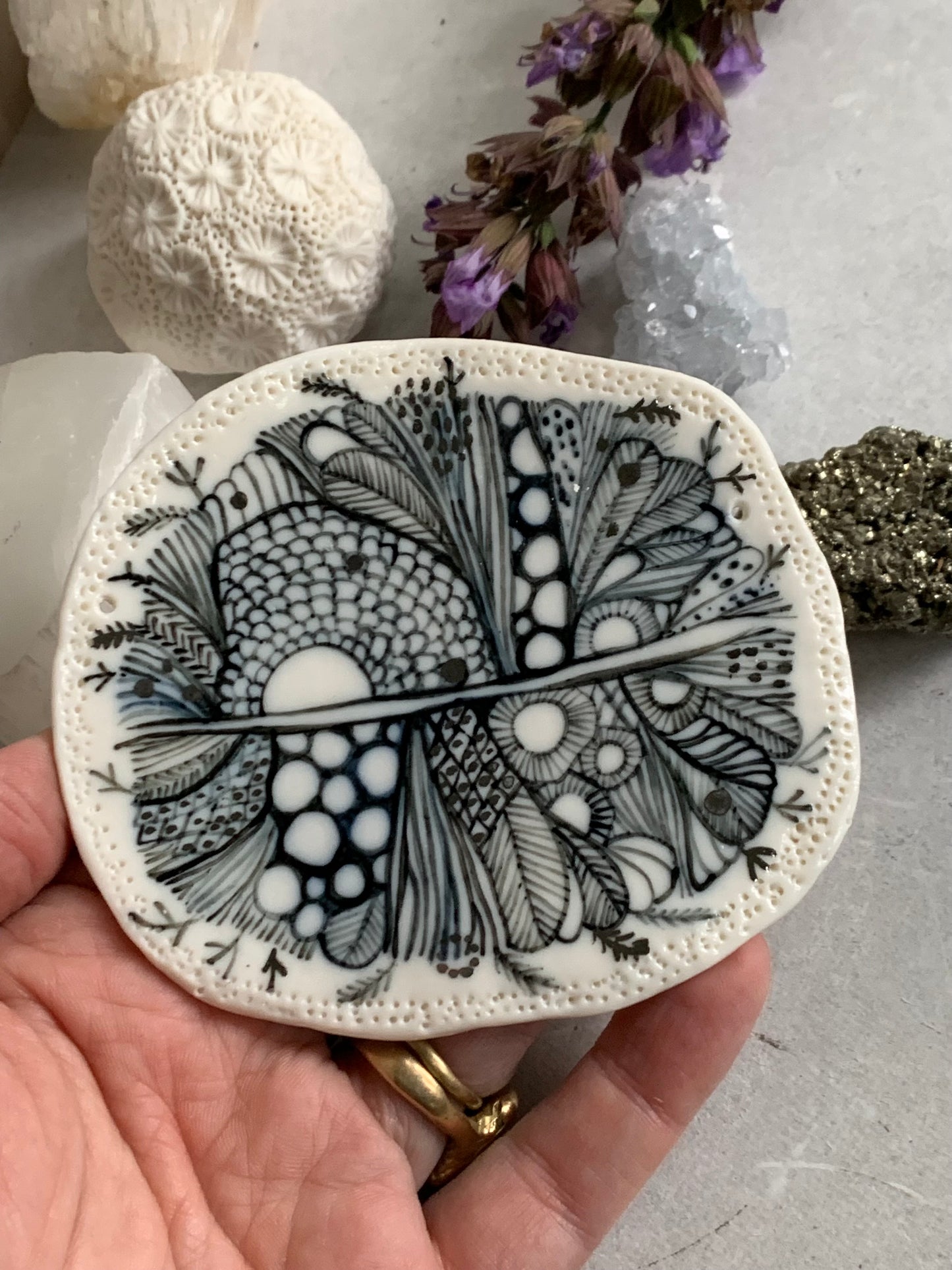 ‘Indigo Seafoam’ small porcelain wall piece, with silver detail