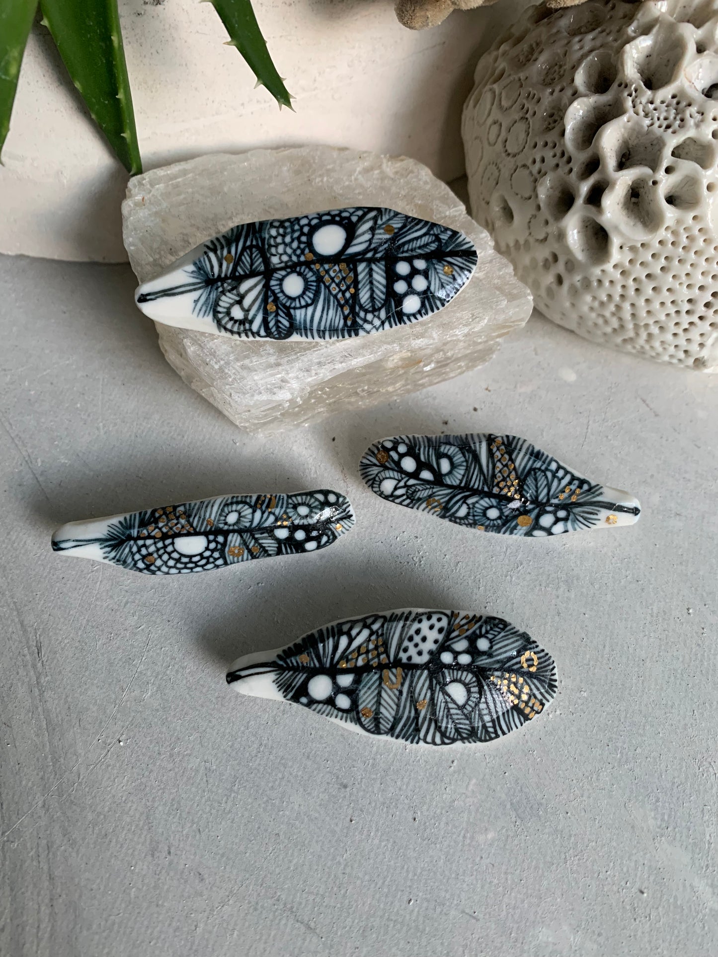 Blue and white hand painted ‘feather’ brooch, choose one